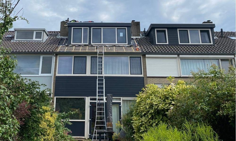 Wat kost een plat dak herstellen in Almere?